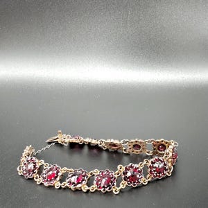 Vintage förgyllt silverarmband med fasetterade granater