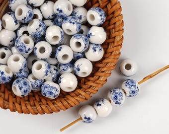 10pcs Deep Blue Plum Blossom Ceramic Beads - Handmade High-Fire Porcelain for Jewelry & Home Decor