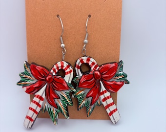 Festive Candy Cane Earrings – Red Bow & Pine Leaves | Hand Painted Christmas Jewelry