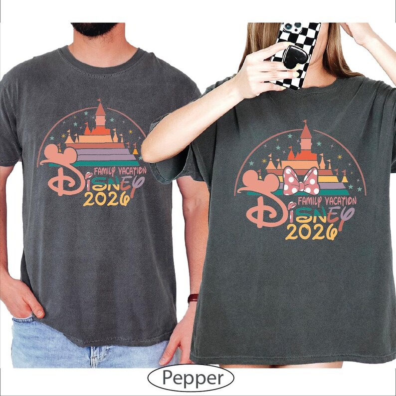 A man and a woman are wearing matching t-shirts with a Disney-themed design.