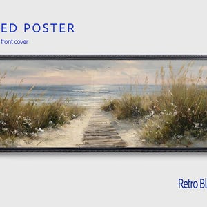 May include: A panoramic framed poster featuring a coastal landscape with a wooden boardwalk leading toward the ocean. The scene includes tall beach grasses, white flowers, and a calm sea under a soft sky. The artwork is enclosed in a retro black frame.