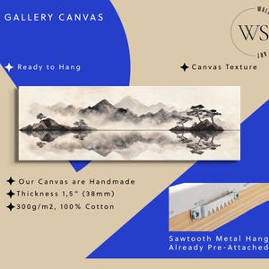 May include: Gallery canvas art print featuring a serene landscape with mountains, trees, and water reflections. The artwork is in shades of gray and brown. The canvas is 1.5 inches (38mm) thick and made of 100% cotton. The text "GALLERY CANVAS" and "Ready to Hang" are visible.