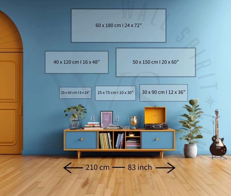 May include: A blue media console with two drawers and open shelving, featuring a record player, a plant, and a guitar nearby. Six rectangular wall art size guides are displayed with dimensions: 60x180 cm (24x72"), 40x120 cm (16x48"), 50x150 cm (20x60"), 20x60 cm (8x24"), 25x75 cm (10x30"), and 30x90 cm (12x36"). A floor measurement of 210 cm or 83 inches is indicated.