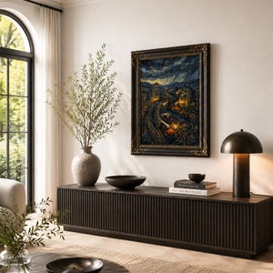 May include: A living room scene featuring a dark wood cabinet with a framed painting, a vase with greenery, and a table lamp. The painting has a dark, ornate frame and depicts a scene with figures and lanterns. A round coffee table and a rug are in the foreground.