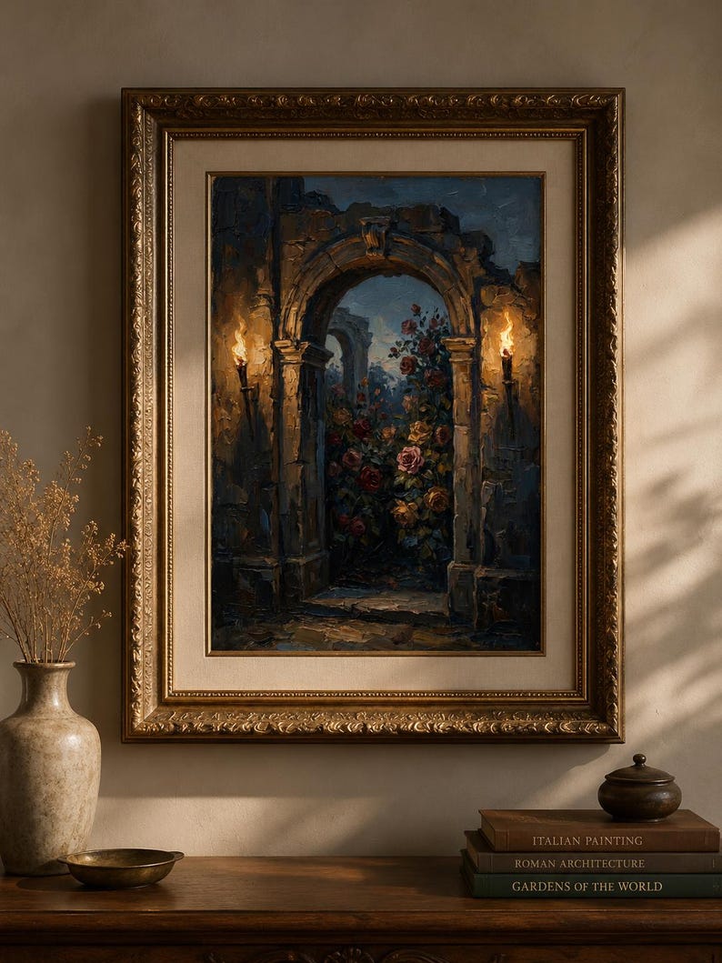 May include: An oil painting in a gold ornate frame shows an archway leading to a rose garden. Two torches light the scene. A vase with dried flowers, a small bowl, and books are on a wooden surface.