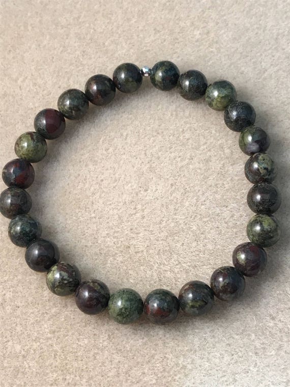 Dragon Stone Bracelet Dragons Blood Jasper Bracelet Stretch Etsy Dragon Stone Bracelet Dragons Blood Jasper Bracelet Stretch Etsy