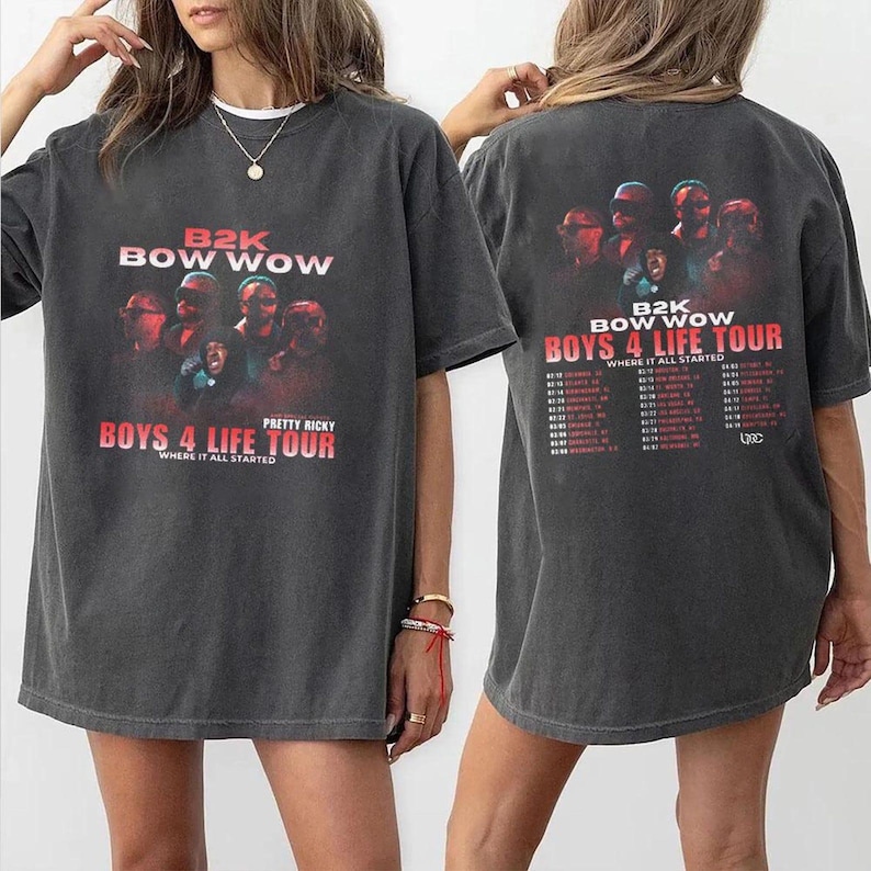 May include: Dark gray t-shirt featuring the text "B2K BOW WOW BOYS 4 LIFE TOUR" in red and white. The front of the shirt displays a group of people with the text "PRETTY RICKY WHERE IT ALL STARTED". The back of the shirt has a tour date list.