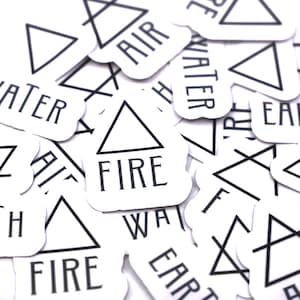 May include: A collection of white stickers with black geometric shapes and the words "Air", "Water", "Earth", and "Fire".