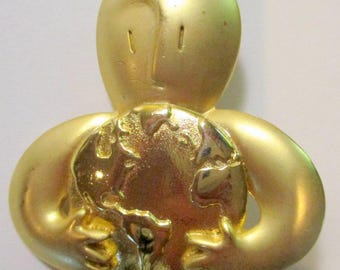 Vintage JJ Brooch: Man Holding Globe - Jonette Jewelry Collectible