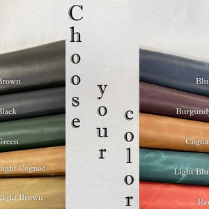 May include: A color chart featuring swatches of leather in various shades, including brown, black, green, light cognac, light brown, blue, burgundy, cognac, light blue, and red. The text "Choose your color" is displayed vertically.