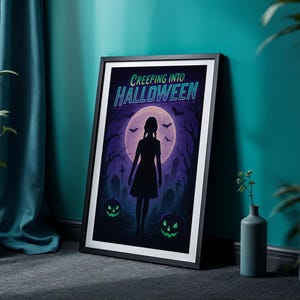 May include: A framed Halloween-themed poster featuring a silhouette of a girl in a black dress standing before a full moon. The poster has a purple and green color scheme with the text "CREEPING INTO HALLOWEEN" at the top. Two glowing jack-o'-lanterns are at the bottom.