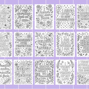 May include: A collection of 18 black and white inspirational quote cards. Each card features floral and botanical illustrations with phrases like "I am worthy" and "Believe in Myself". The cards are arranged on a lavender background.