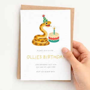 May include: A white birthday invitation card featuring a cartoon snake wearing a colourful party hat next to a small cake with a single lit candle. The text reads: PLEASE JOIN US FOR OLLIES BIRTHDAY, 12PM SATURDAY JULY 12TH, 333 CAKE ST, NEW YORK, RSVP JEN 08 8764 8432.