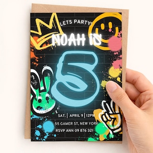 May include: A set of three ceramic mugs with a speckled, matte finish. The mugs are in shades of cream, light gray, and dark gray. Each mug has a simple, minimalist design and a rounded handle. The mugs are stacked on top of each other.