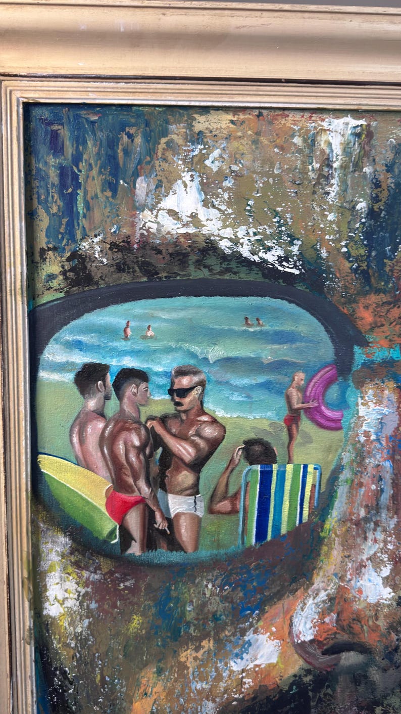 May include: Oil painting in a gold frame depicts a beach scene with several figures. The figures are in swimsuits, some in the water, others on the sand. A pink inflatable ring is visible. The painting has a textured, impressionistic style.