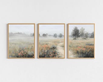 Puede incluir: Conjunto de tres láminas artísticas enmarcadas de paisajes. Cada lámina presenta una escena de campo serena con un camino, flores silvestres y árboles. La paleta de colores incluye verdes apagados, marrones y toques de rojo.