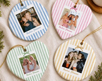 May include: Four ceramic ornaments with striped patterns in blue, pink, green, and yellow. Each ornament features a square photo of friends, a small bow graphic above the photo, and the cursive text Bestie Forever printed below the image.