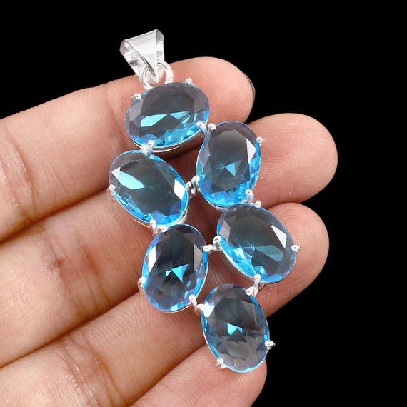 Handmade Sterling Silver Blue Topaz Pendant: Boho Healing Jewelry