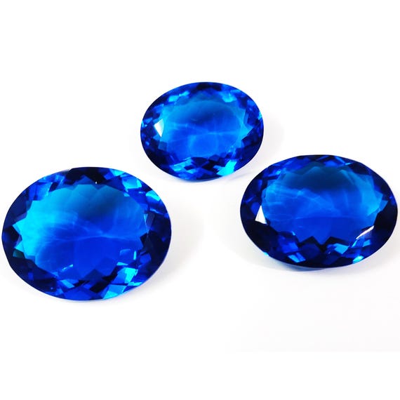 Lab-Created Blue Topaz Oval Gemstone: Faceted Loose Stone