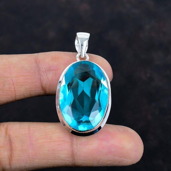 Handmade Sterling Silver Swiss Blue Topaz Pendant: Boho Healing Jewelry
