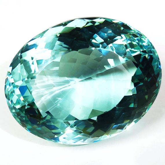 Faceted Oval Aquamarine Gemstone: Lab-Created AAA Grade, 100 Carat