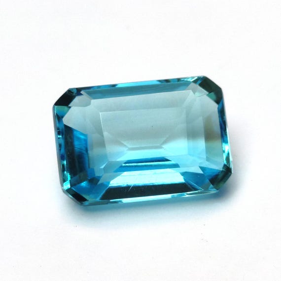 Emerald Cut Swiss Blue Topaz Gemstone: AAA Grade, Faceted, Lab-Created