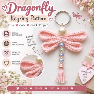 May include: A crochet dragonfly keychain featuring a large cream-colored bead head, four light pink crocheted wings, and a body composed of three iridescent beads, a pink bell-shaped bead, and a pink yarn tassel attached to a silver metal ring.