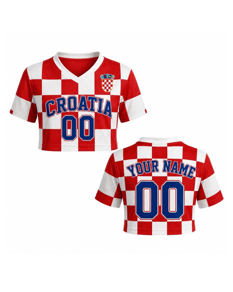 May include: Croatia crop top in red and white checkered pattern. Features the word "CROATIA" and the number "00" in blue. The back of the shirt has the words "YOUR NAME" and the number "00".