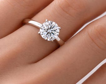 1.50ct Round Cut Moissanite Solitaire Engagement Ring: Knife Edge Band