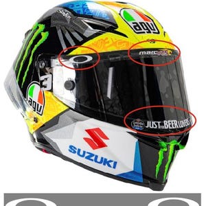 Könnte beinhalten: Ein Set von Visieraufklebern für einen Joan Mir Helm, bestehend aus einem ovalen Logo, einem Marc VDS Racing Team Logo und zwei Estrella Galicia 0.0 Just for Beer Lovers Aufklebern, abgebildet auf einem gelb-schwarz-weißen Motorradhelm.