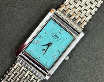 SEIKO Exceline クォーツ時計 𝐒𝐄𝐈𝐊𝐎 𝐄𝐗𝐂𝐄𝐋𝐈𝐍𝐄 𝐓𝐀𝐍𝐊 𝟏𝟗𝟖𝟒 Ref. 8420-5540 #SOLD