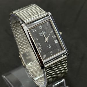 Vintage Seiko Dress Watch – Slim Tank Style Quartz, Black Dial, Stainless Bracelet