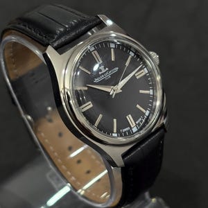Jaeger-LeCoultre Club vintage, esfera negra clásica, cuerda manual suiza, correa de piel