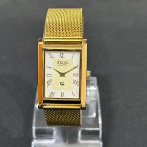 Elegant Vintage Seiko Quartz Watch, Slim Rectangular Case, White Roman Dial