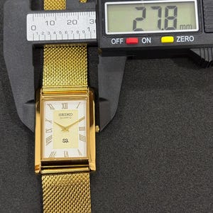 Seiko Vintage Men’s Dress Watch, Slim Tank Design, White Roman Dial