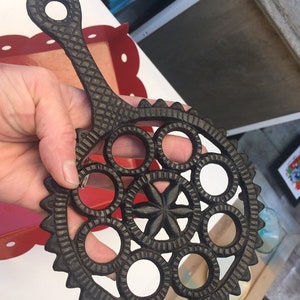 Vintage cast iron hex star trivet