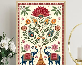 May include: A framed art print with a vibrant tree design and elephants. The artwork displays a cream background with a red lotus flower, orange and blue details, and two blue elephants with red saddle blankets. The frame is a light brown colour.