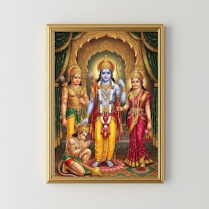 May include: A framed print featuring Hindu deities in a golden, ornate setting. The central figure is blue-skinned, wearing a crown and holding a bow. Other figures include a woman in a red sari and two figures in yellow and green attire.