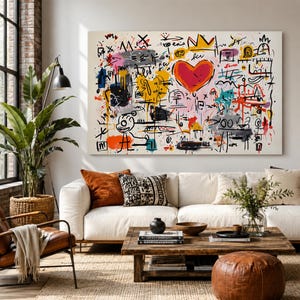 May include: A large rectangular canvas wall art piece featuring a vibrant, chaotic composition of abstract graffiti-style markings, scribbles, and shapes in red, yellow, blue, and black, centered around a prominent, bold red heart illustration.