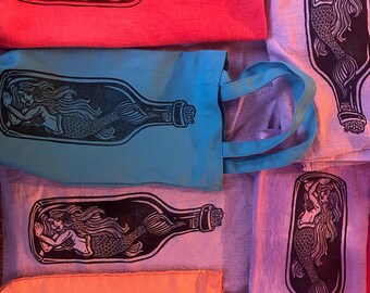 Mermaid inside Bottle tea towel