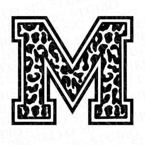 May include: A black and white letter "M" in a varsity style. The letter is outlined in black with a white border. The interior of the letter features a leopard print pattern.