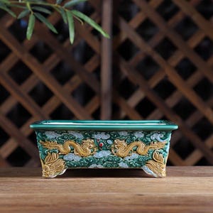 Vaso per bonsai in ceramica cinese fatto a mano con drago, vaso rettangolare smaltato con doppio rilievo di drago, classico elemento d'arredo asiatico per piante da interno.