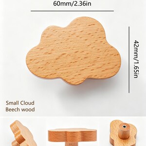 May include: A light brown beech wood cabinet knob shaped like a cloud. The knob measures 2.36 inches in width and 1.65 inches in height. The text Small Cloud Beech wood is visible. Three additional views show the side profile and the metal screw hole.