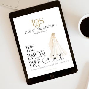 May include: A tablet screen displaying a digital document titled The Bridal Prep Guide. The page features the logo for The Glam Studio, a graphic illustration of a person in a white wedding gown with a veil, and the text A curated touch from my brush to your day.