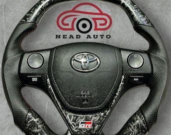 Toyota Corolla (2014/2021) Volante in fibra di carbonio forgiata e pelle.