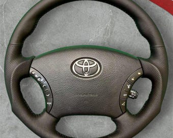 Volante personalizzato in pelle nera compatibile con Toyota Tacoma, Tundra e 4Runner.