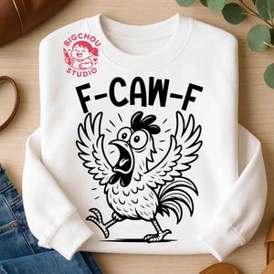 May include: White sweatshirt featuring a black and white cartoon rooster graphic. The rooster is mid-squawk with its wings spread and the text "F-CAW-F" above it. The Bigchou Studio logo is in the upper left.