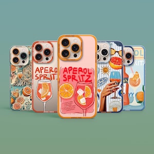 May include: A collection of phone cases with Aperol Spritz-themed designs. The cases feature illustrations of cocktails, oranges, and text, with a color palette of orange, pink, and blue. The cases are designed to fit a smartphone.
