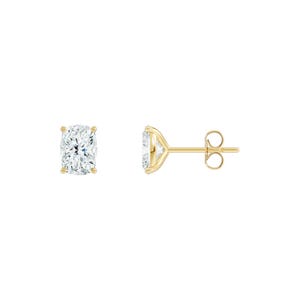 May include: A pair of diamond stud earrings with a cushion-cut center stone. The earrings are set in a gold metal setting. One earring is shown from the front, and the other is shown from the side.