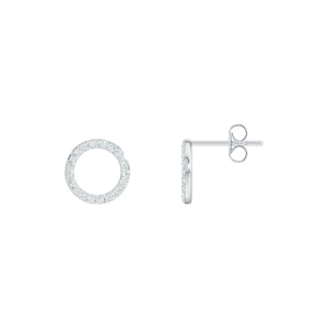May include: A pair of silver stud earrings. Each earring features a circular design encrusted with small, clear gemstones. The earrings are displayed against a white background, showcasing their sparkling details and minimalist style.